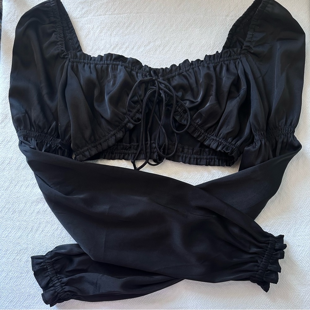 H&M black long sleeve crop top, size S, with a neckline.